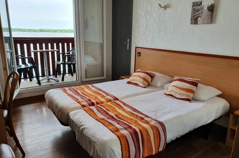 Chambre appartement 2 lits simples