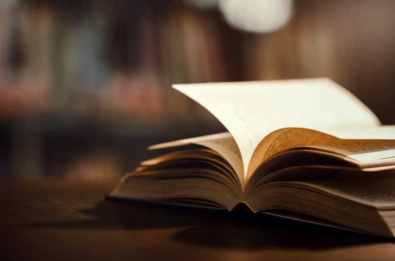 Book in library with open textbook,education learning concept